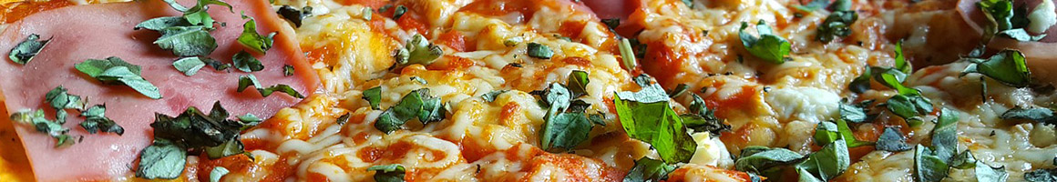 Eating Italian Pizza at Pizzeria Mimosa restaurant in Hereford, AZ.